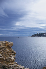 beautiful cliff against blue sea and sky in Spanish town of Magaluf