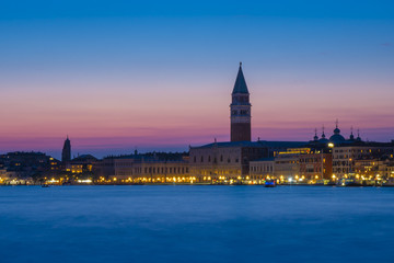 Fototapeta premium Venice at twilight. Blue hour on the San Marco basin. Italian landscape. Venice postcard.