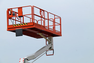 A Work Platform Cage on a Hydraulic Lifting Arm.