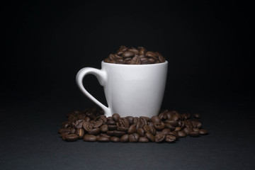 coffee beans and cups with low light