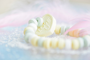 Heart  shape with love sign in pastel colors