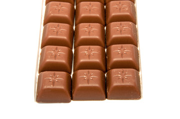 Tasty chocolate in squares on the white