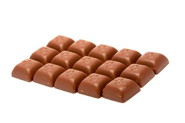 Tasty chocolate in squares on the white