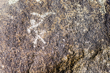Historical rock carvings during summer inside open air museum near Cholpon-Ata , close to Issyk-Kul...