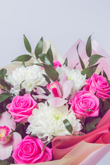 beautiful bouquet of bright rose flowers, on white background