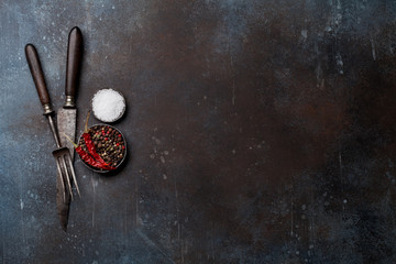 Vintage meat knife, fork and spices