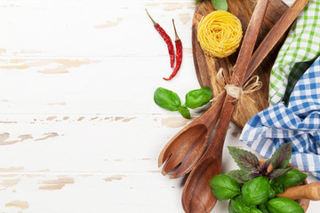 Cooking table with utensils and ingredients