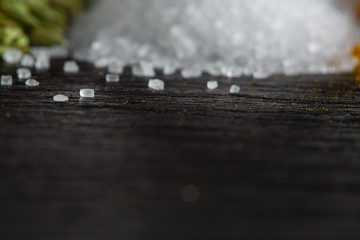 Particles of sea salt on the stone surface are large and strongly blurred background