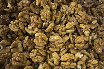 Walnuts background. Kernels walnuts. Top view. Vegetarian or healthy eating.