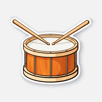 Sticker of classic wooden drum with drumsticks