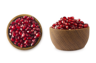 bowl with pomegranate seeds isolated on white background. Ripe pomegranates close-up. Sweet and juicy garnet with copy space for text.