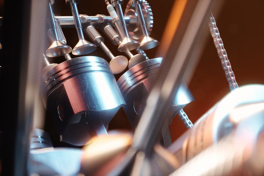 3d illustration of an internal combustion engine. Engine parts, crankshaft, pistons, fuel supply system. V6 engine pistons with crankshaft on a black background. Illustration of car engine inside.