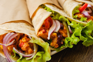 Burrithos with chicken, pepper and beans close up