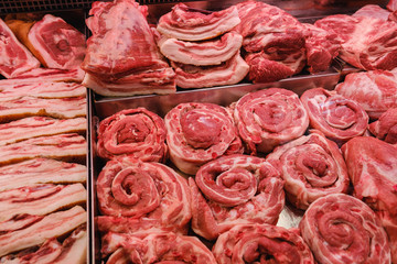 Meat beef and pork sold on the counter at in refrigerator supermarket