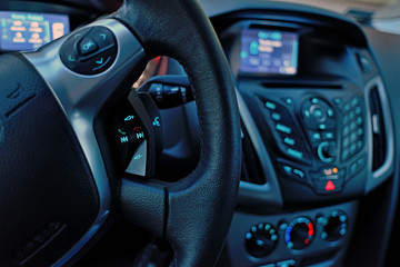 Obraz na płótnie Canvas Car dashboard and steering wheel inside of car.