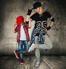 Mother and son dance hip-hop.Urban lifestyle. Hip-hop generation.	