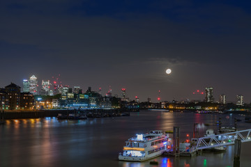 Fototapeta na wymiar City cruise ships on the river Thames