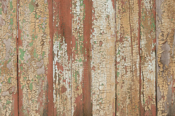 Background of old retro vintage aged wooden texture with peeling paint.