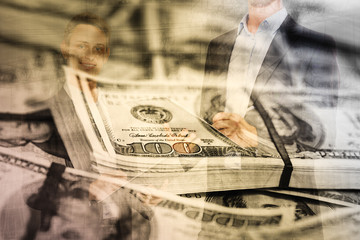Businessman on background banknotes