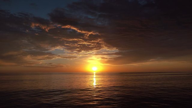 Sunset over the ocean 4K