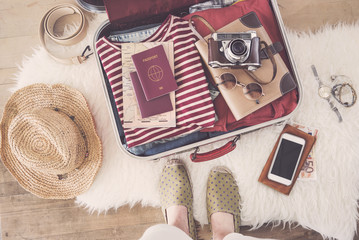 Travel suitcase preparing concept 