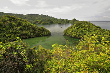 Obraz premium Bangkas and balangays anchored-bay to the S.of Latasan island. Sipalay-Philippines. 0367
