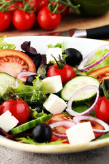 Salad with cheese and fresh vegetables and olives. Greek salad.