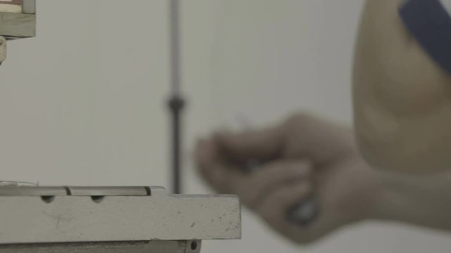 Close up of a machine at a tailor shop