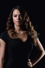 Beautiful and attractive model in black dress.