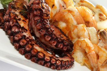 close up seafood salad with octopus and shrimps