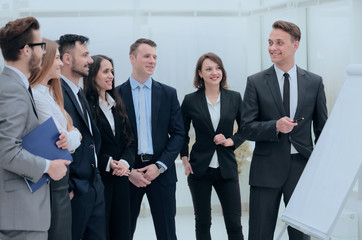 businessman pointing pen on blank Board for presentation