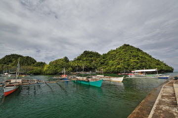 Fototapeta na wymiar Balangay or bangka boats anchored-Panaon river mouth. Sipalay-Philippines. 0377