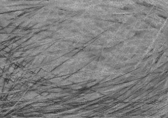 Hand drawn pastel crayons scribble on grey chalk background. Black and white abstract textured background for original design