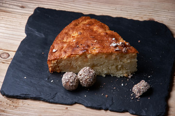 Delicious fresh baked piece of apple pie on shale board