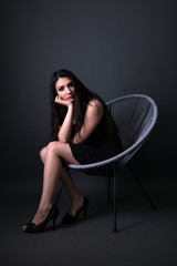 Naklejka premium Young arabic woman isolated on gray background