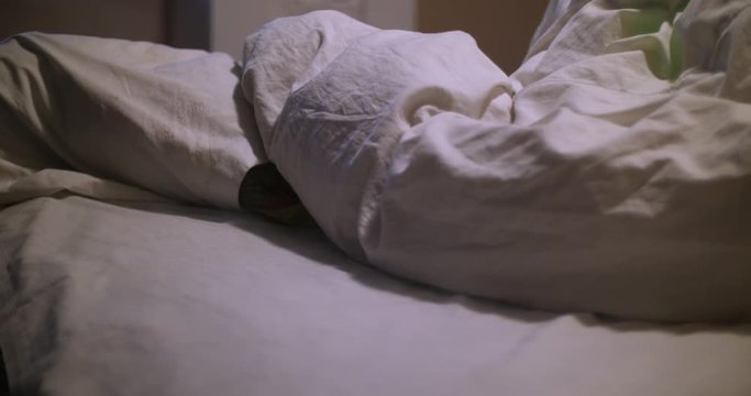 Green smoke from under the blankets