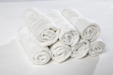the White spa towels pile isolated on white background