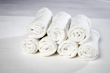 the White spa towels pile isolated on white background