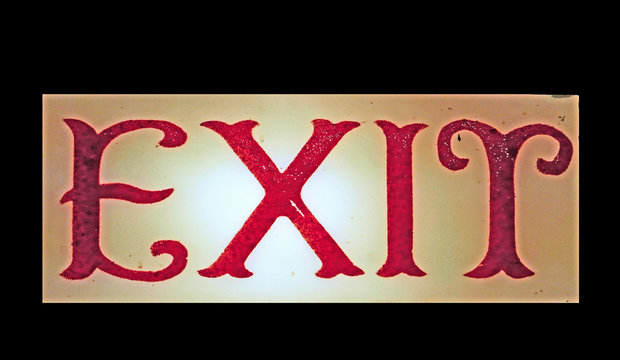 Old-fashioned hand-painted exit sign