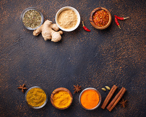 Traditional Indian spices on rusty background