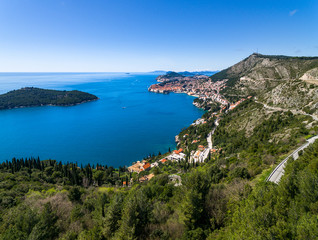 Fototapeta premium Stunning Aerial View of Dubrovnik old city and vibrant blue Adriatic Sea 