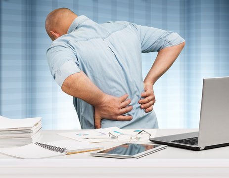 Back pain in office.