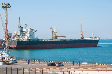 Big container ship in the dock in the port, Odessa, Ukraine.