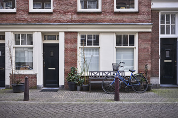 an old brick building with a bicycle
