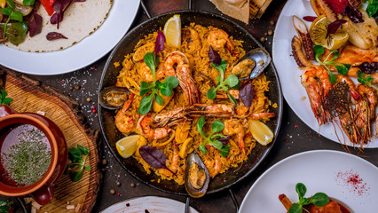 Assorted Spanish food set Paella seafood platters, grilled seafood