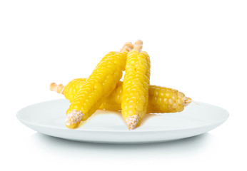 corn in white plate on white background