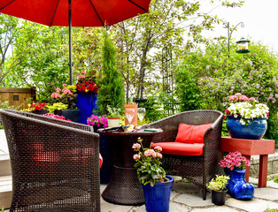 Outdoor patio oasis for relaxation and afternoon wine in the garden