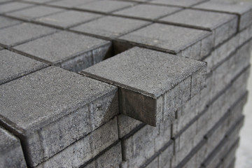 Concrete paving slabs blocks texture background, close-up.