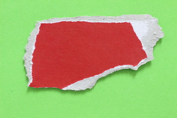 colored torn paper as a background. copy space