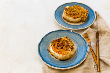 Turkish pastry borek in blue ceramic plate